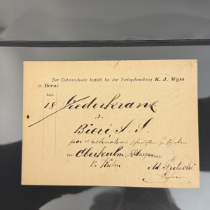 Vintage Swiss order card with K. J. Wyss Bern header and elegant cursive handwriting, showing recipient name and place.