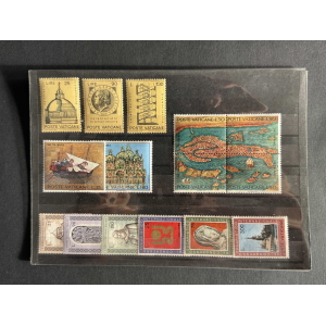 Collection page of Vatican stamps: six stamps on top row (domed building, portrait, architectural design) and two boat/mosaic scenes, plus a row of international stamps at bottom.