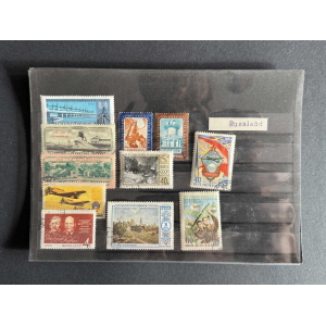 Collection page of vintage Soviet postage stamps mounted on a black album page, with a 'Russland' label on the right.