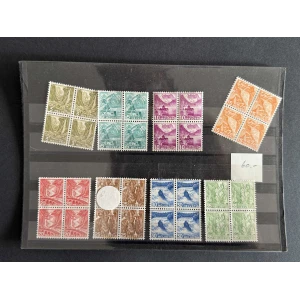BM_1240_f-1.jpg Collector's page with multiple rows of vintage Swiss Helvetia stamps in varied colors (greens, teals, purples, browns, reds, blues, oranges, and oranges) and denominations from 3 to 35, mounted on a black album page.