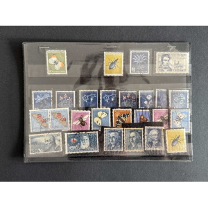 Sheet of vintage Swiss Helvetia stamps in a binder page, arranged in rows and columns.
