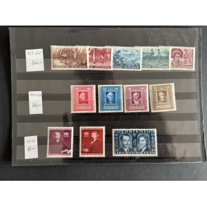 Liechtenstein postage stamps arranged in a page of a stamp album, three horizontal rows with assorted denominations and colors, plus small price notes.
