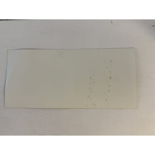 globalcollection.ch - Blank white postcard on a light surface with a few brownish spots along the right edge.